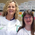 Mrs. Tedder and Ms. Jessi standing with each other, holding science equipment